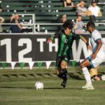 アメリカの大学サッカー部でのプレー画像